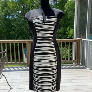 Connected black and beige body con dress